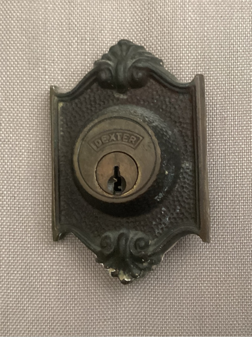 Antique Original Dexter single cylinder exterior escutcheon latch lock.